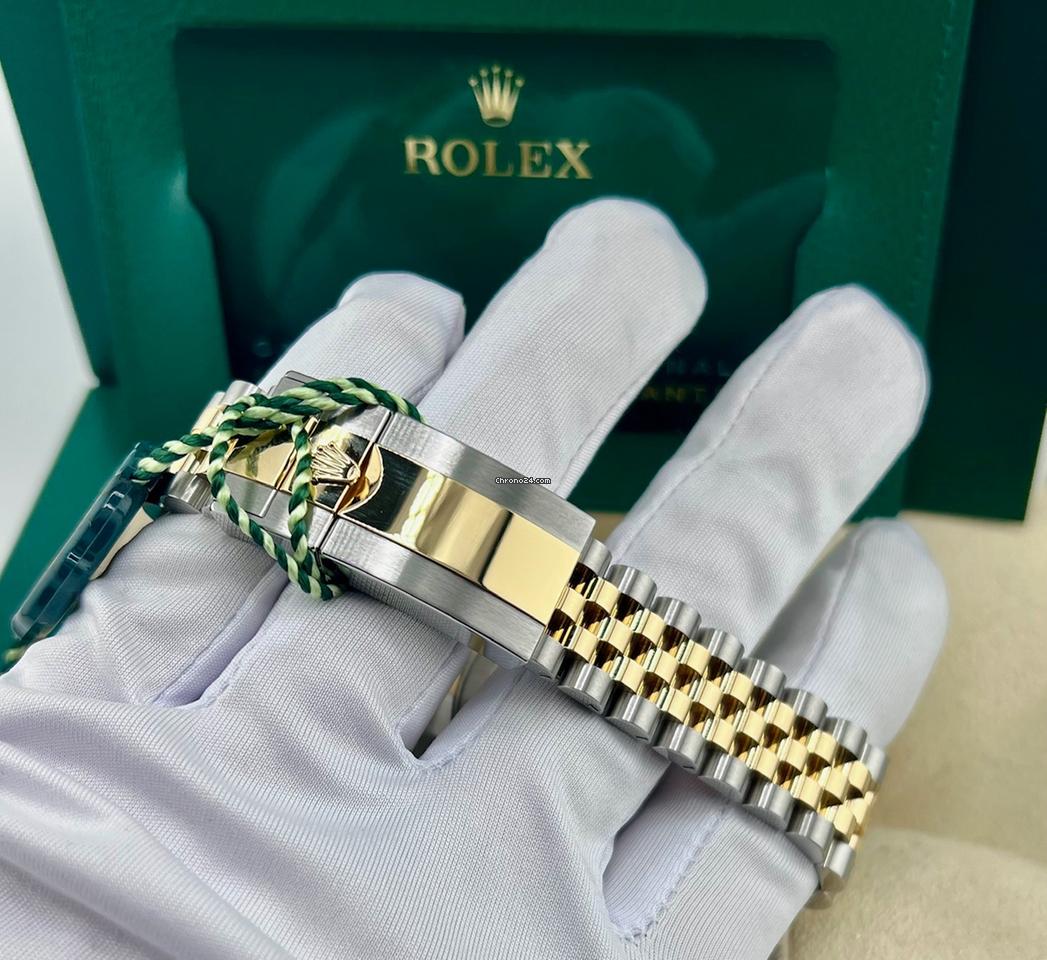 Rolex GMT-Master II Jubilee Silver / Gold