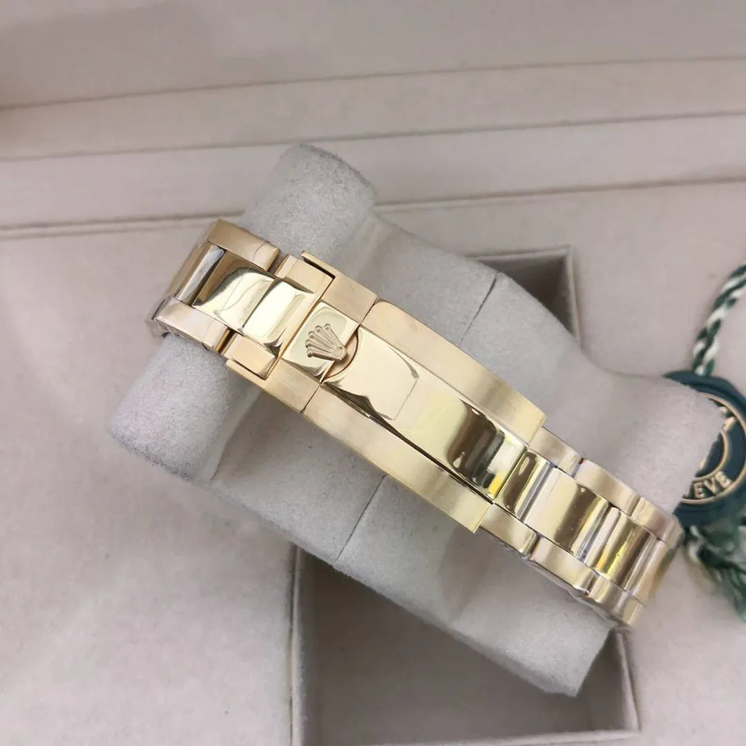Rolex Submariner Jubilee Gold / Blue
